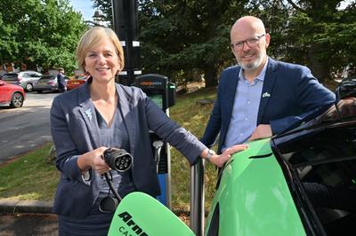 Transport Minister Lilian Greenwood (L) with BVRLA Chief Executive Toby Poston utilising the Raw charging facilities at the Alton Towers Hotel.JPG